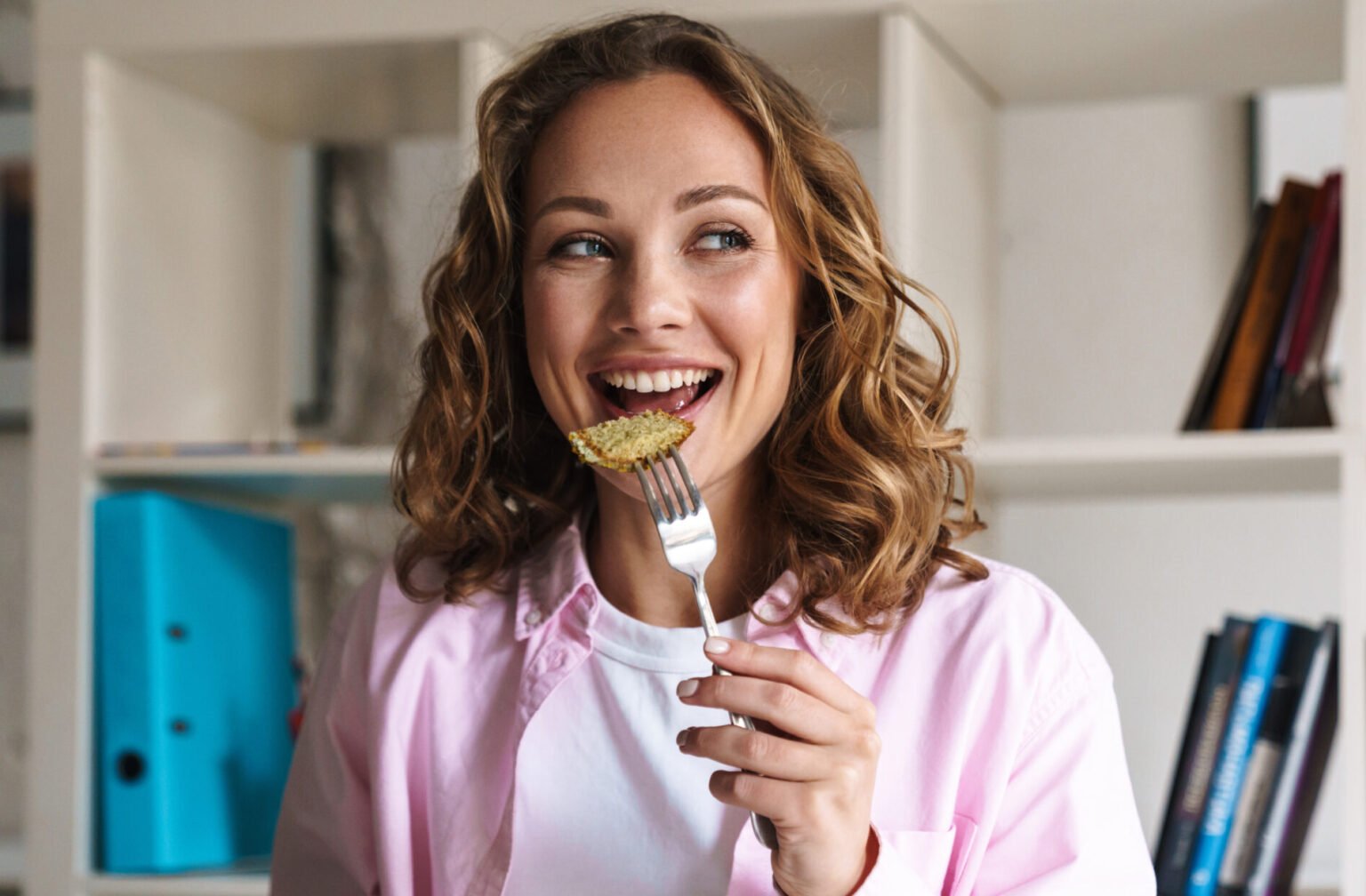 photo-of-joyful-beautiful-woman-eating-cake-and-dr-2025-02-15-20-56-14-utc